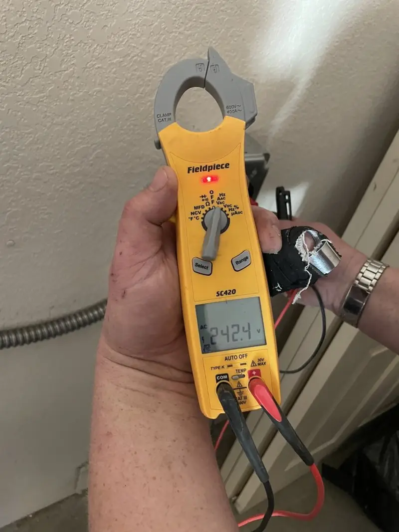 Voltage testing with clamp meter during Generator Installation in West Whittier-Los Nietos